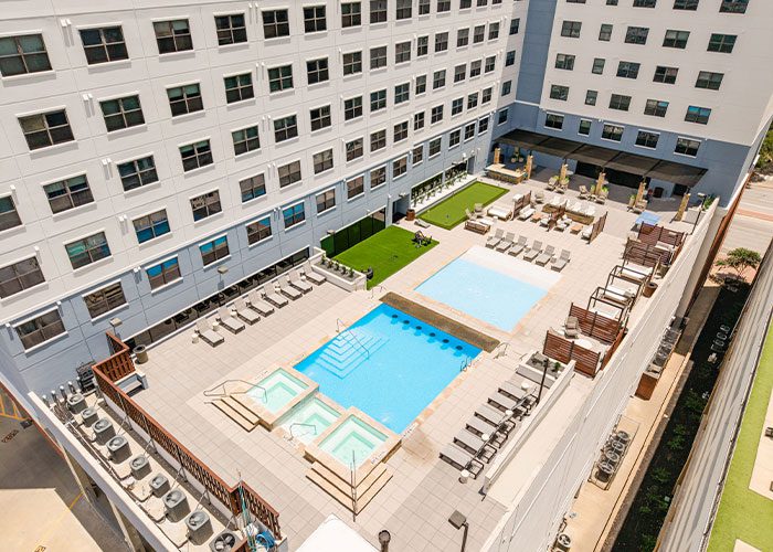 Ariel shot of a apartment complex pool