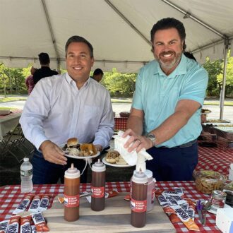 Two men enjoying bbq