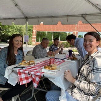Group enjoying BBQ